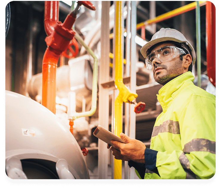 Man in hard hat in manufacturing environment